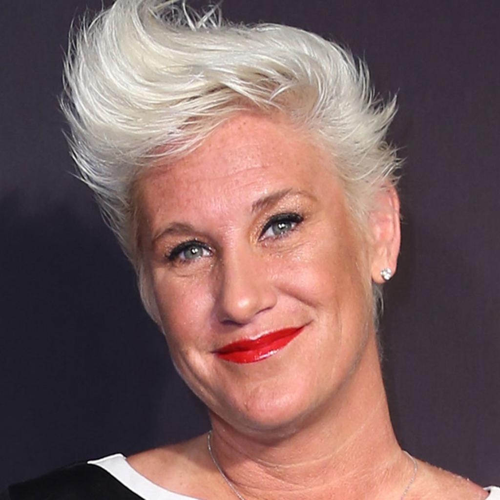 Anne Burrell Children smiling during a Food Network appearance