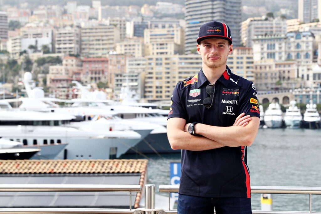 Max Verstappen age showcasing the Formula 1 driver racing at Monaco Grand Prix circuit