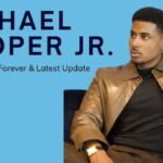 Michael Cooper Jr. at a television premiere with text highlighting his age, career, Netflix’s Forever, and latest updates.